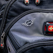 Close-up of a backpack with a MINI Heart pin.