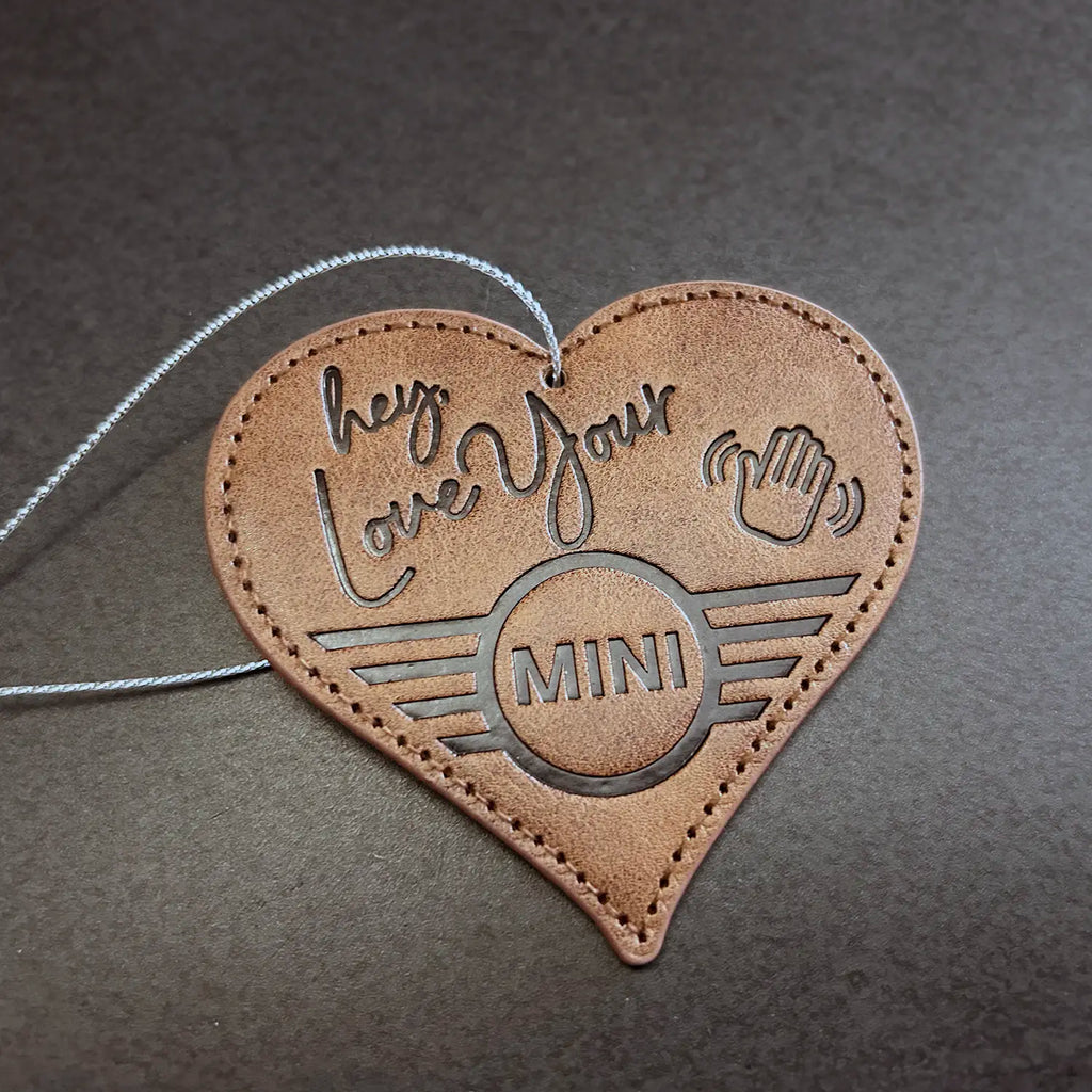 Leather MINI Love Ducking Ornament with ‘Hey, Love Your MINI’ debossed design.