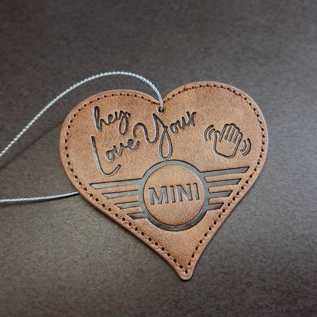 Leather MINI Love Ducking Ornament with ‘Hey, Love Your MINI’ debossed design.