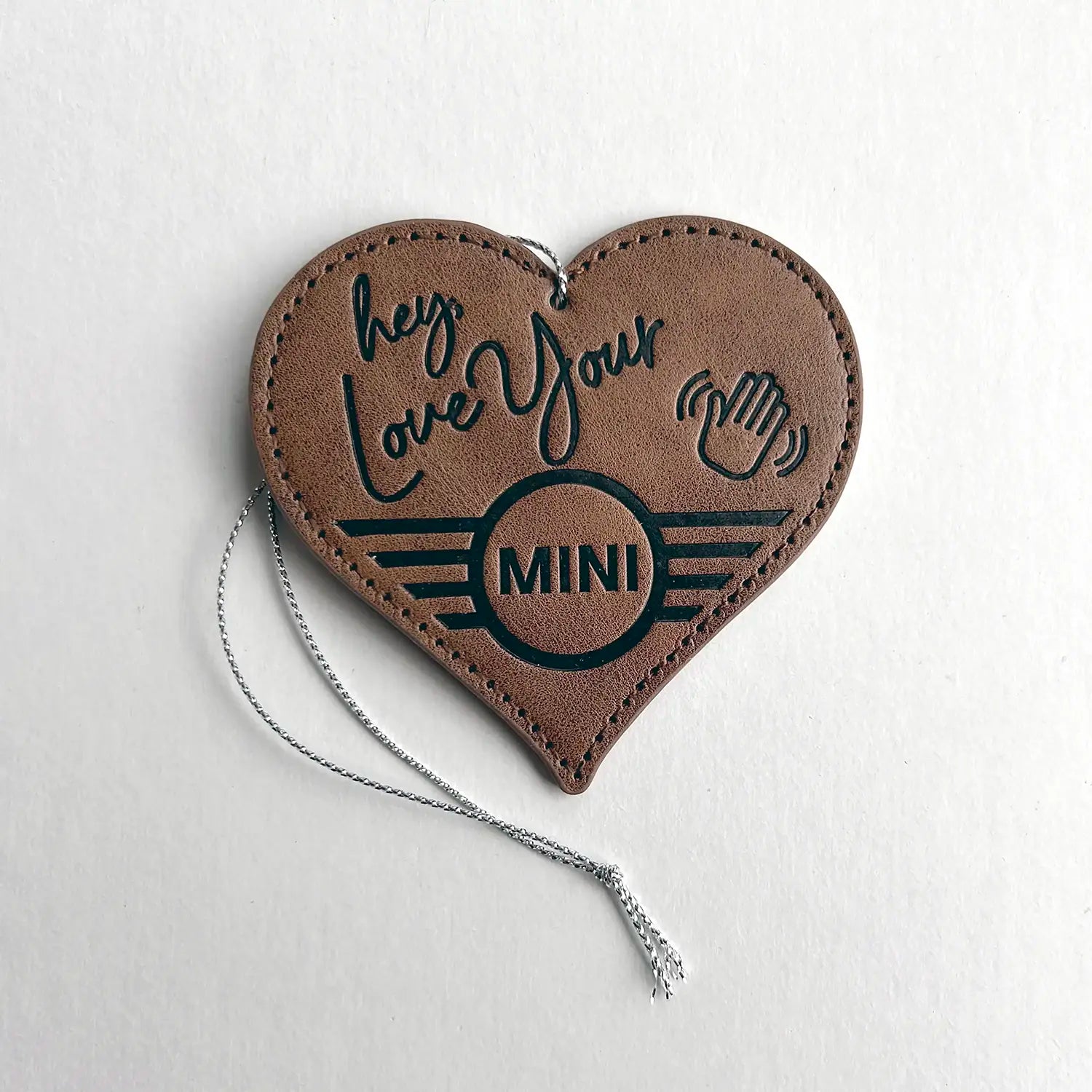 Leather MINI Love Ducking Ornament with 'hey love your MINI' text on a white background.