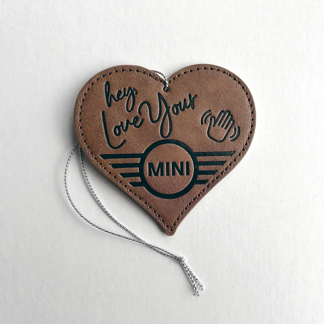 Leather MINI Love Ducking Ornament with 'hey love your MINI' text on a white background.
